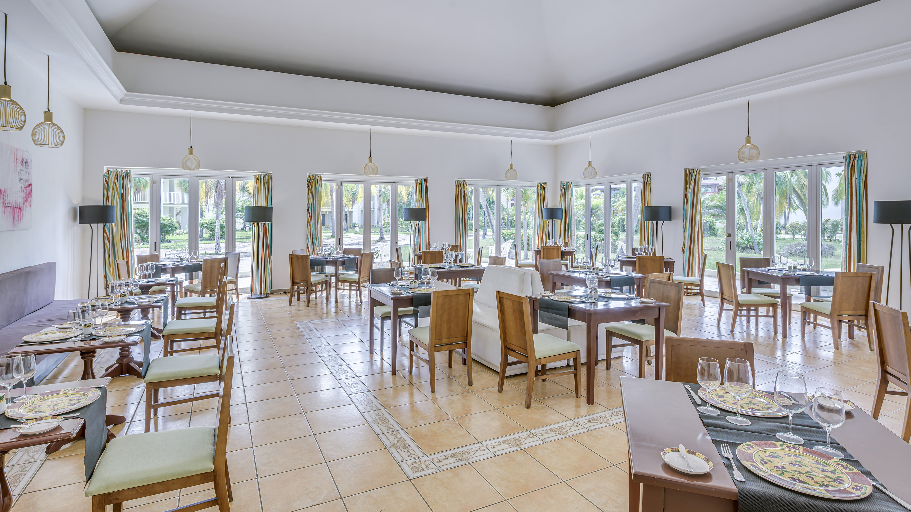 a room with tables and chairs