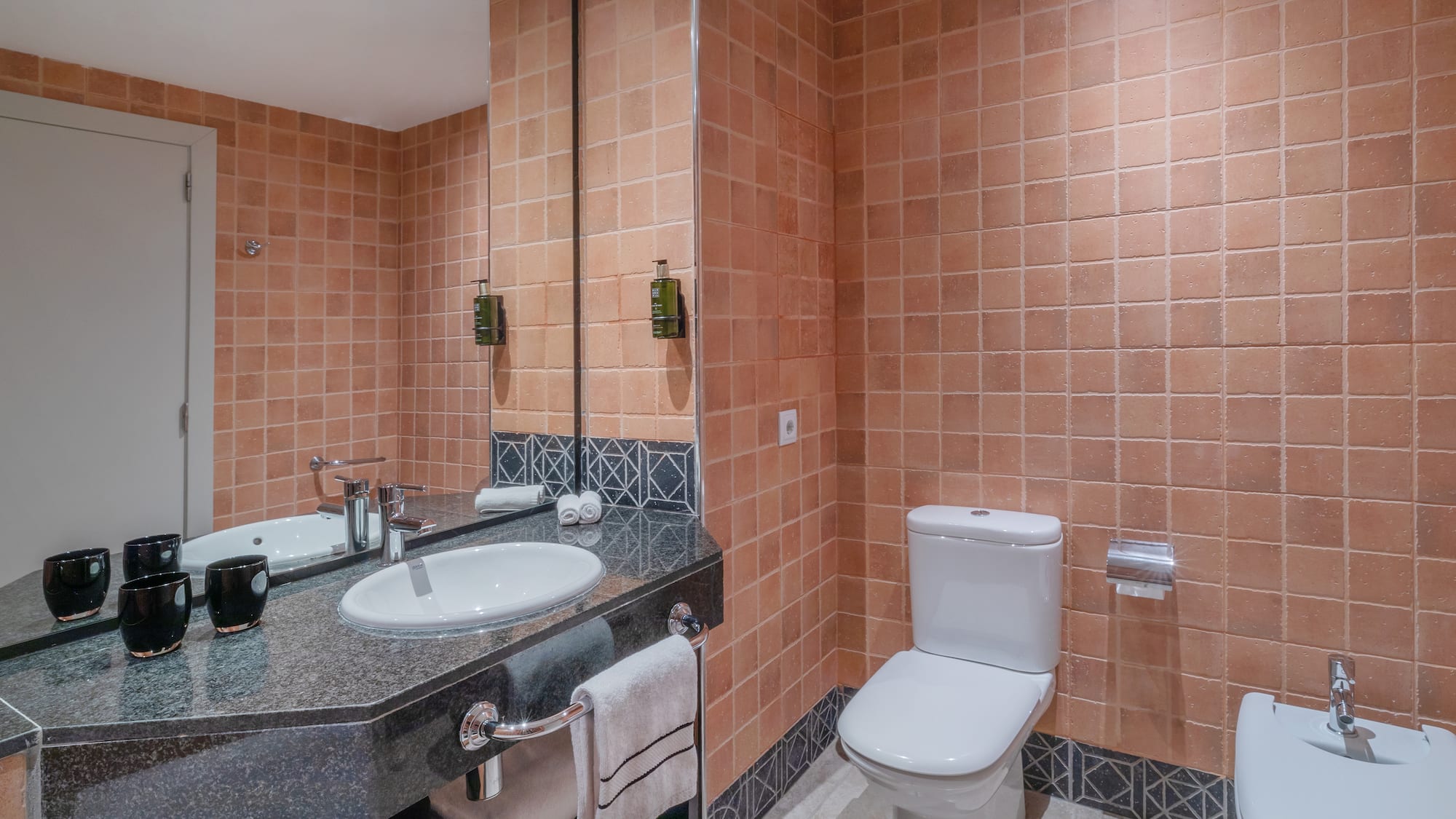 a bathroom with a sink and toilet