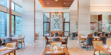 a room with tables and chairs