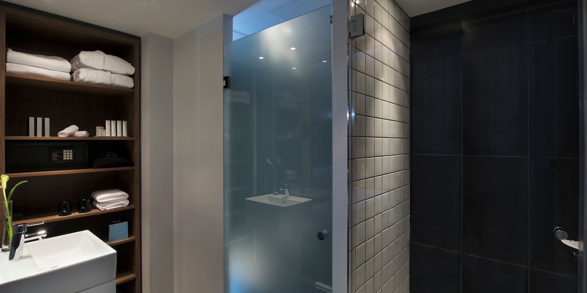 a bathroom with a glass door