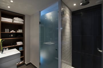 a bathroom with a glass door