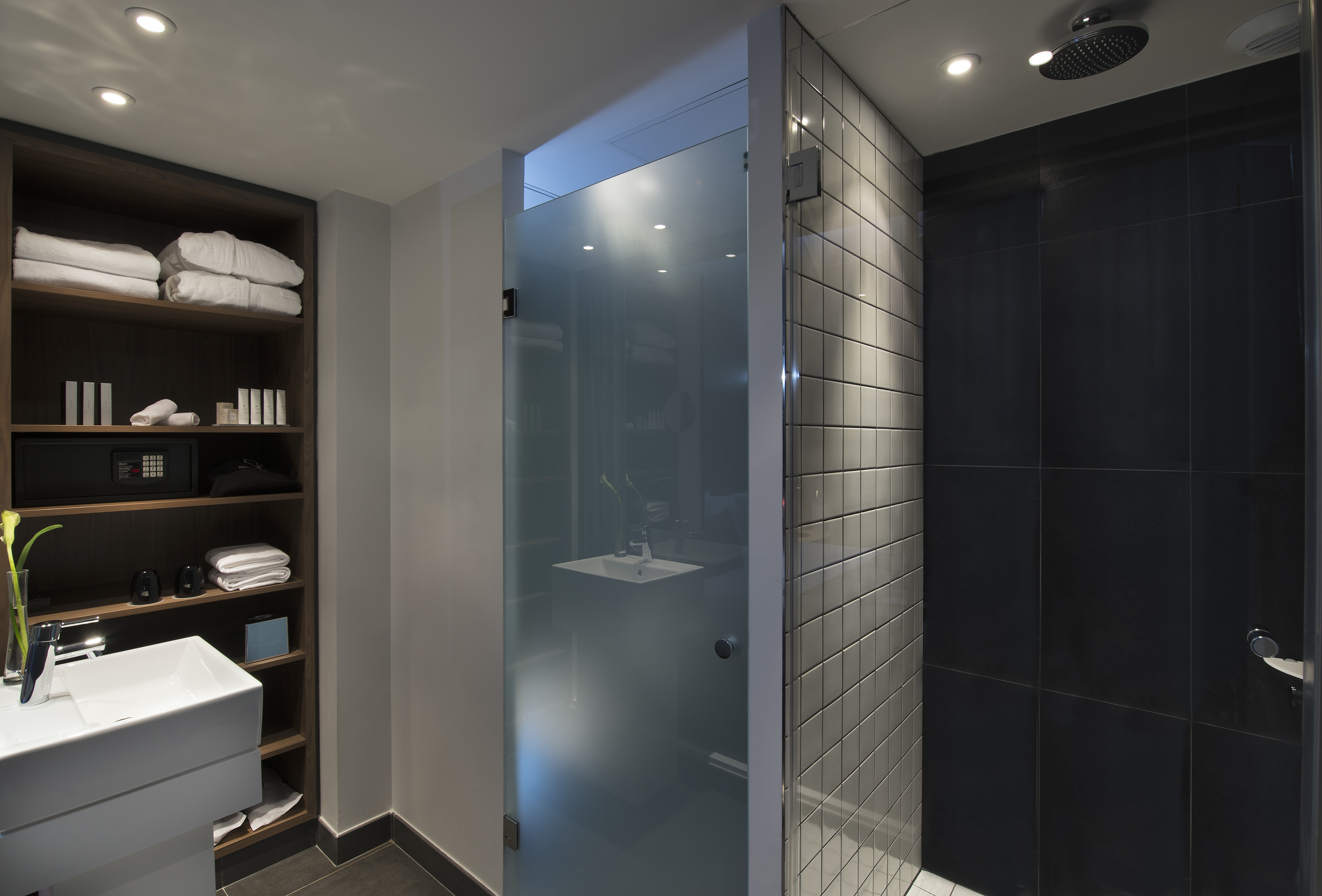 a bathroom with a glass door