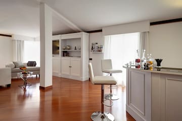 a room with a bar and a couch