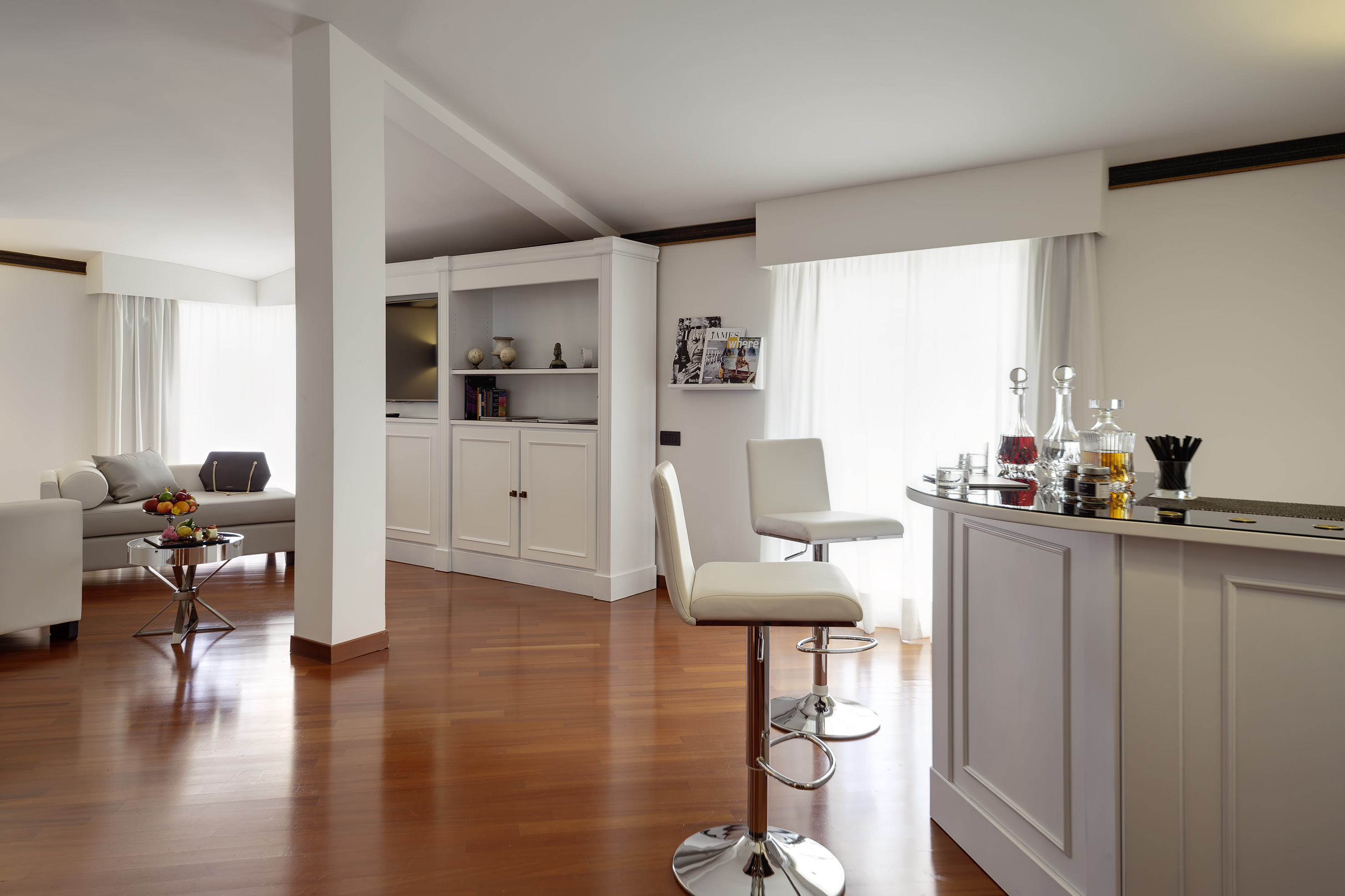 a room with a bar and a couch