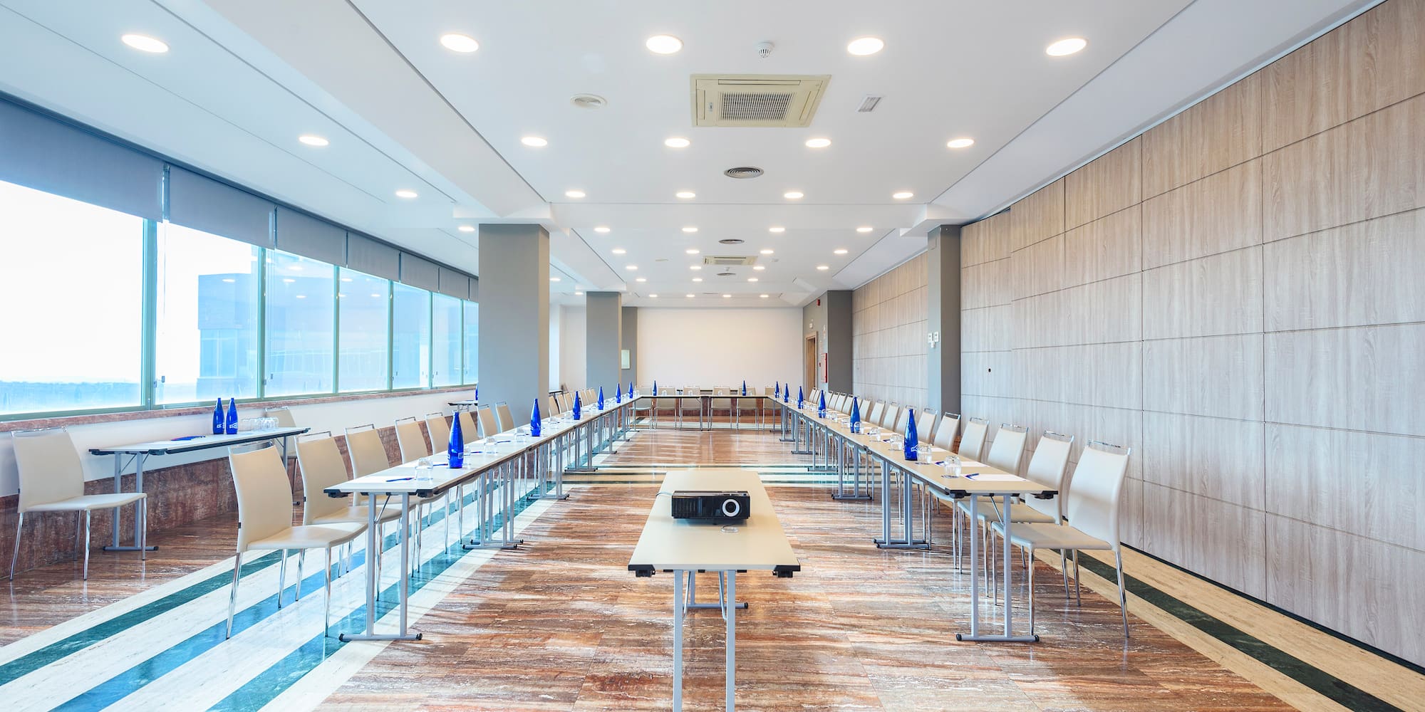 a room with tables and chairs