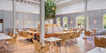 a room with tables and chairs