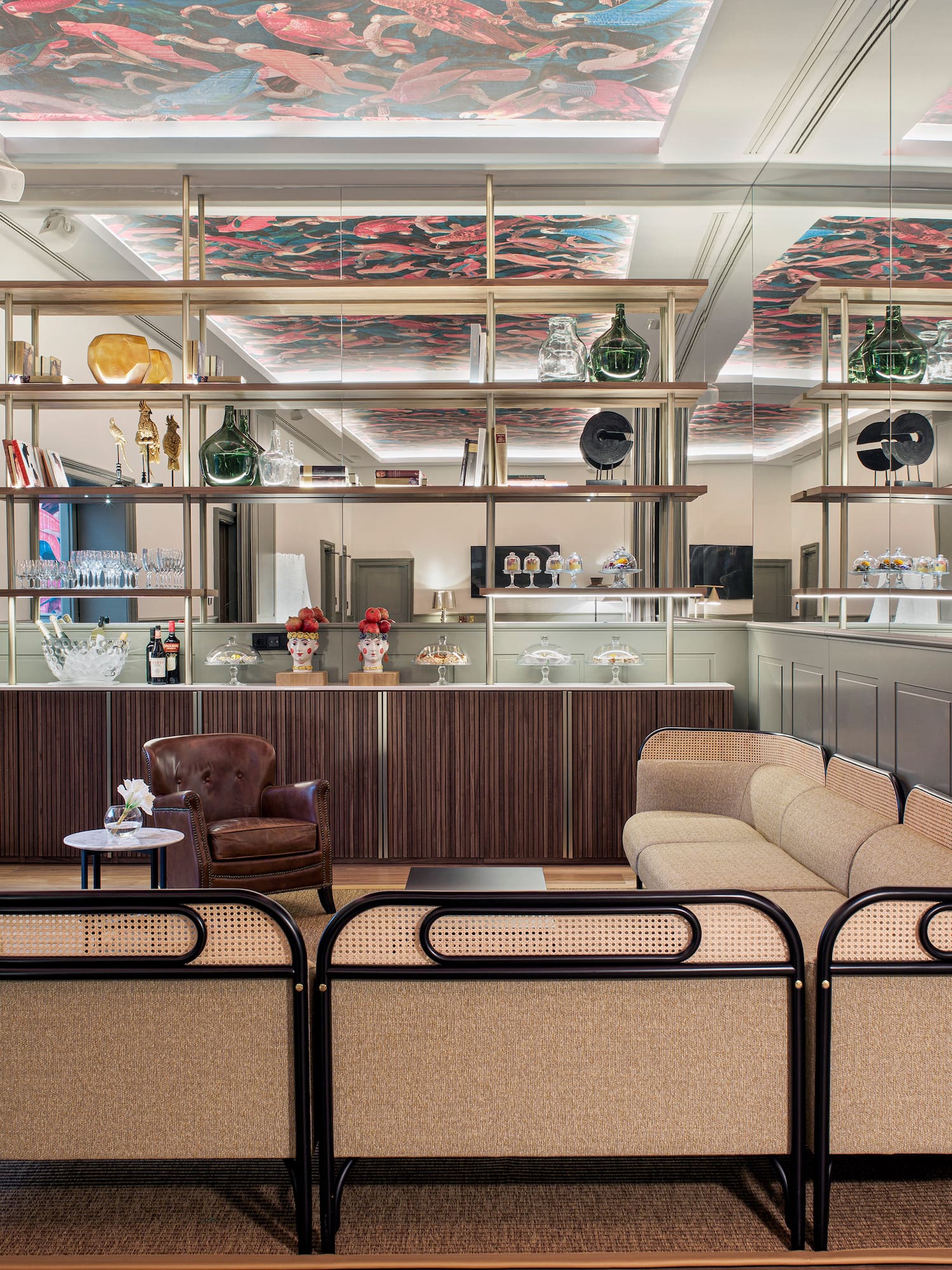 a room with a couch and a bar