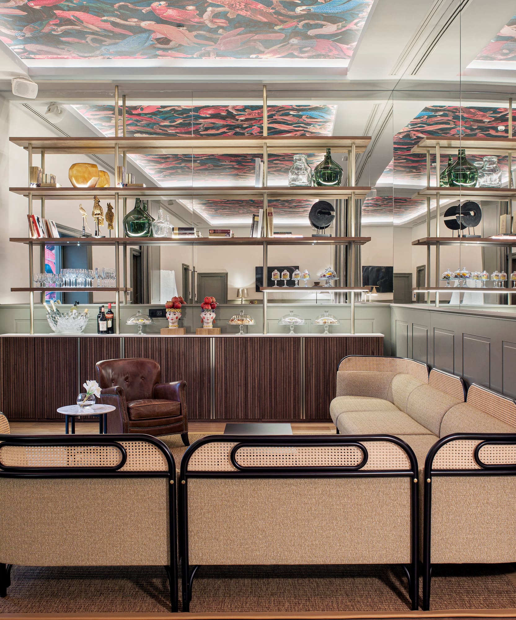 a room with a couch and a bar