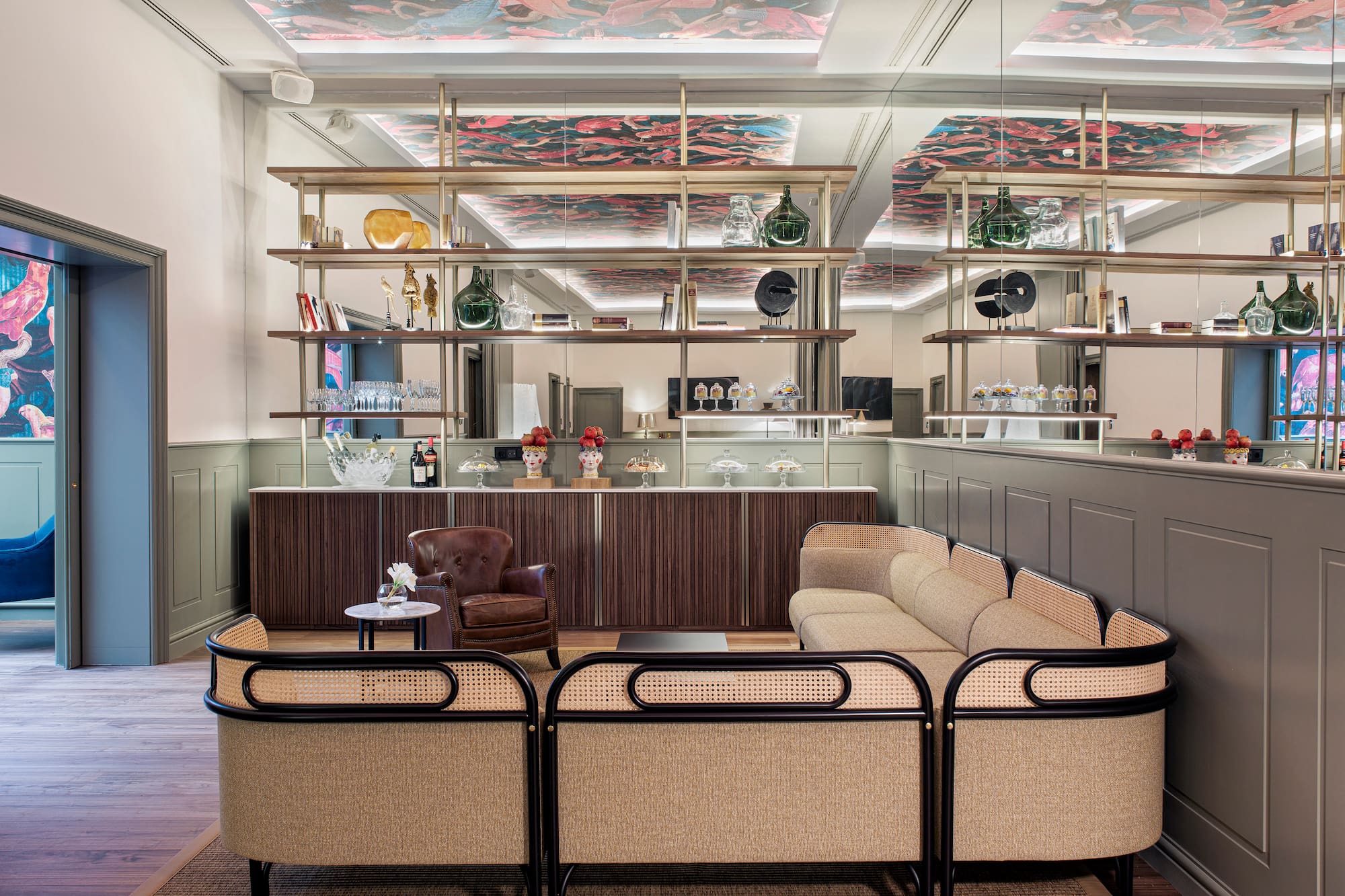 a room with a couch and a bar