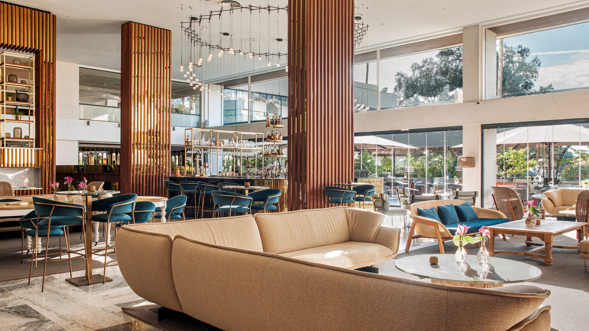 a large room with a large couch and tables