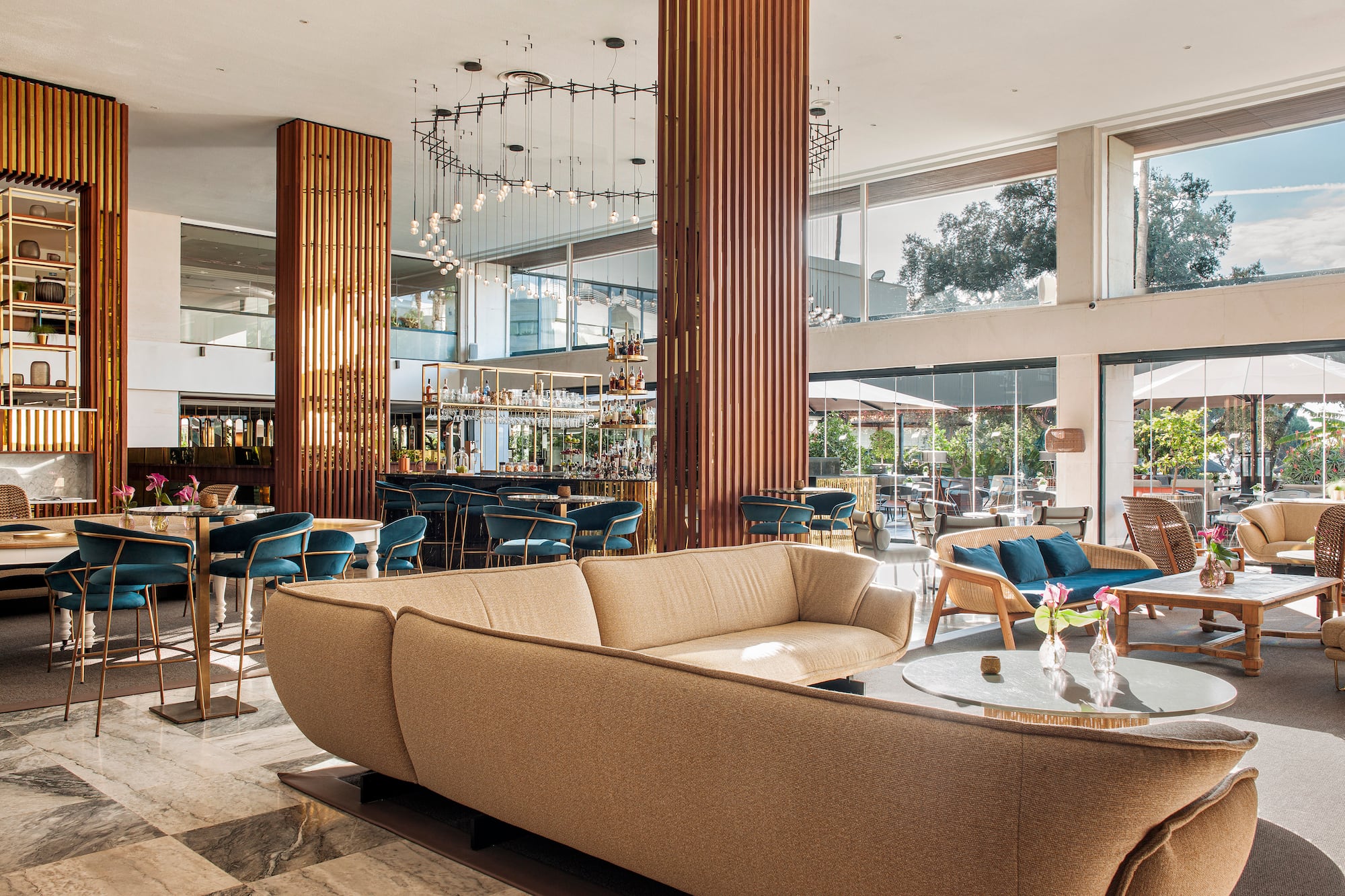 a large room with a large couch and tables