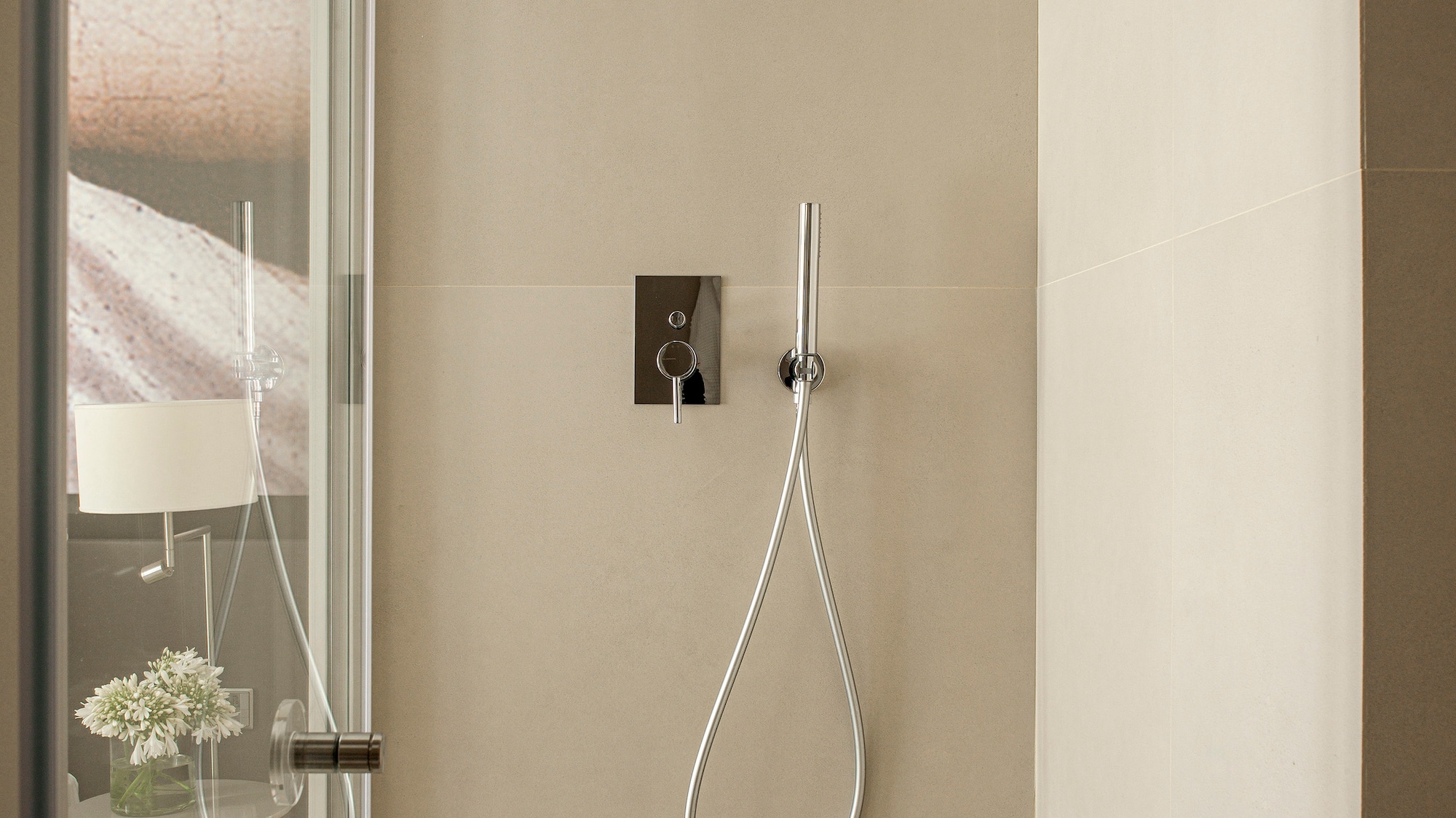 a shower with a hose