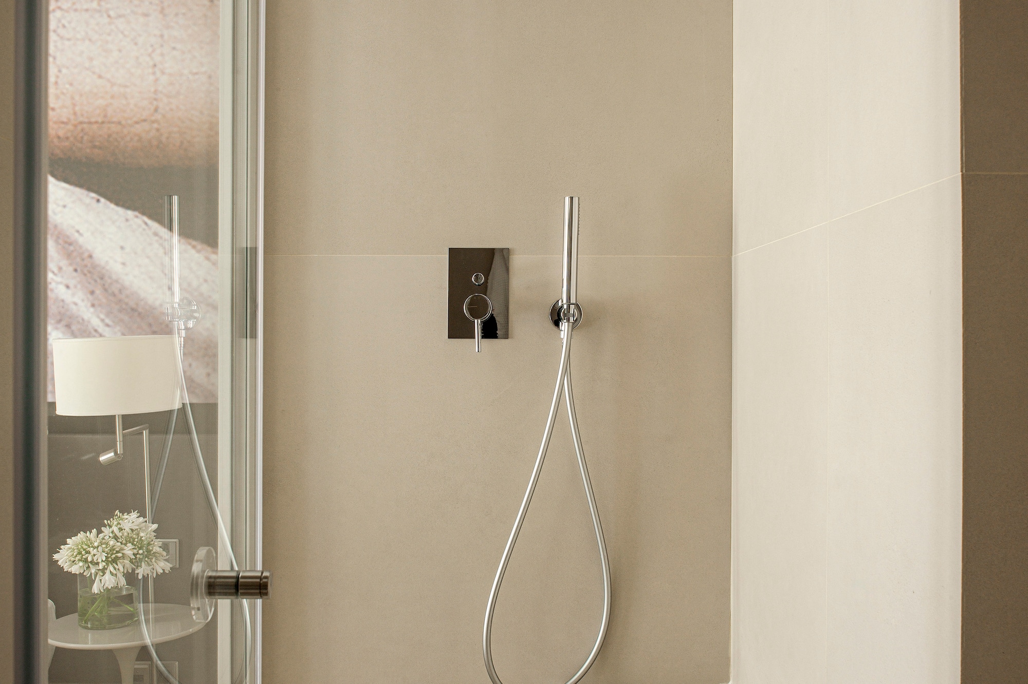 a shower with a hose