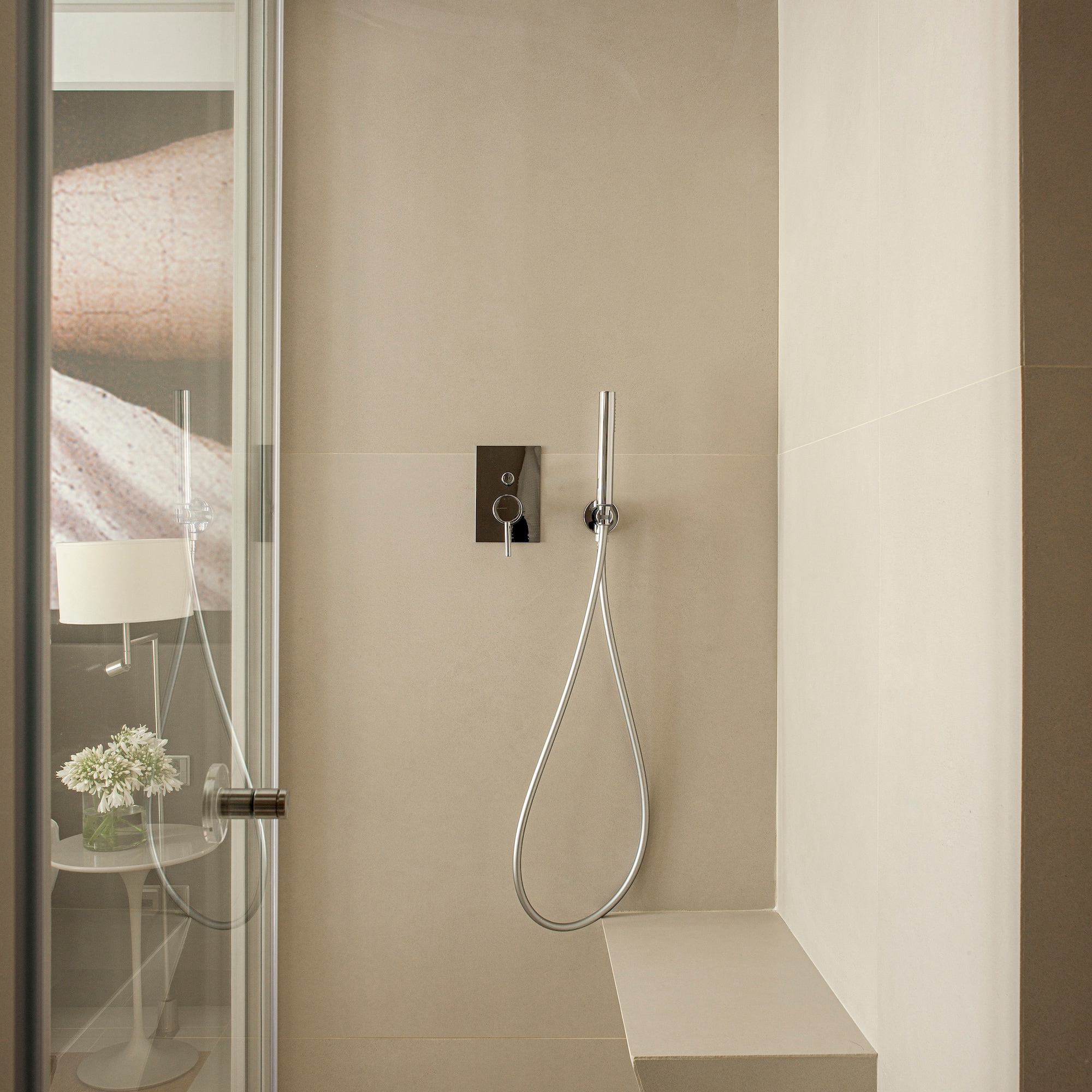 a shower with a hose