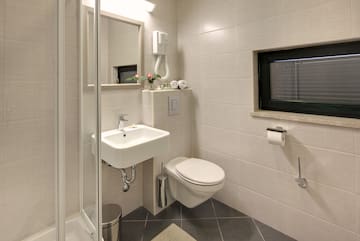 a bathroom with a sink and toilet