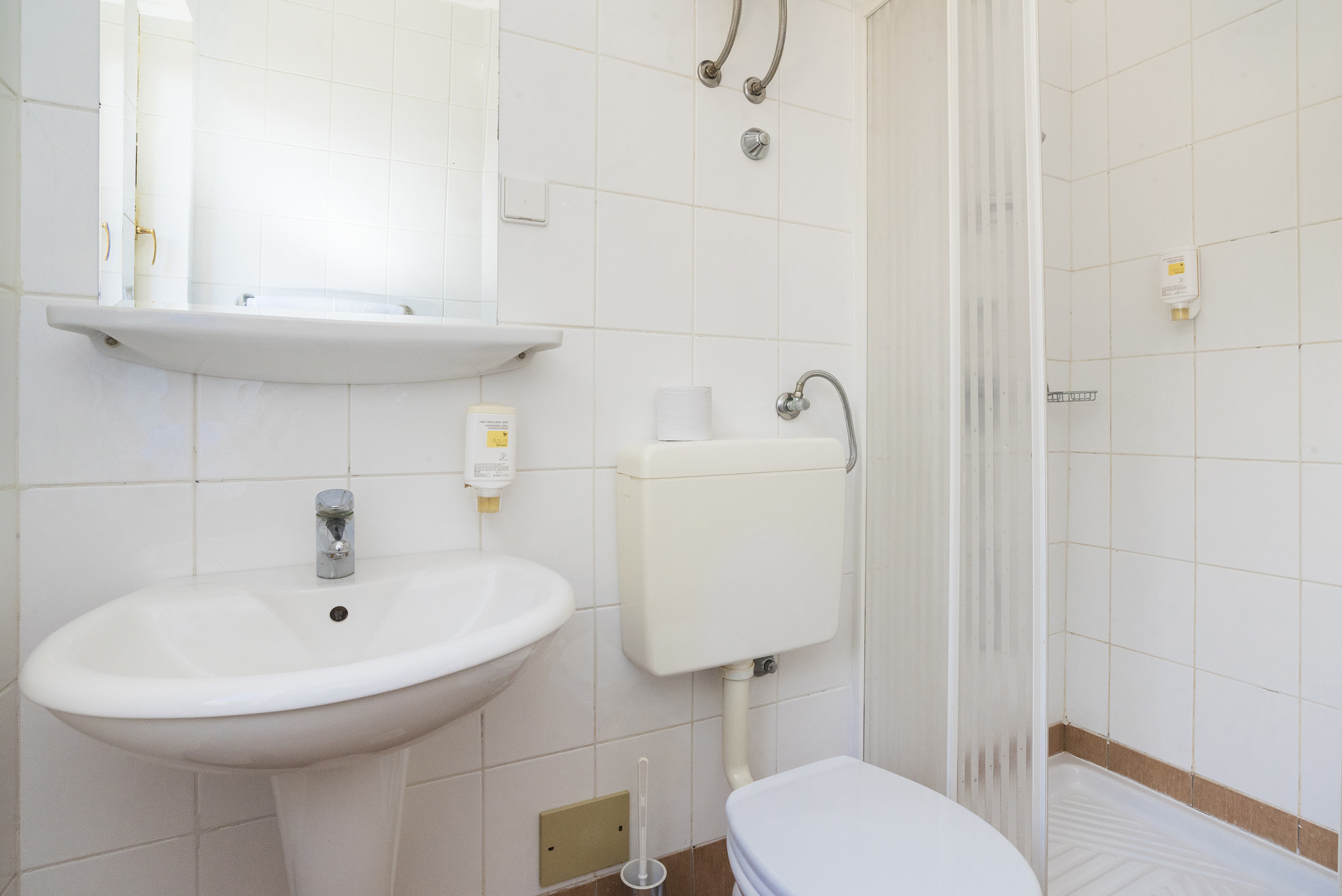 a bathroom with a toilet and sink