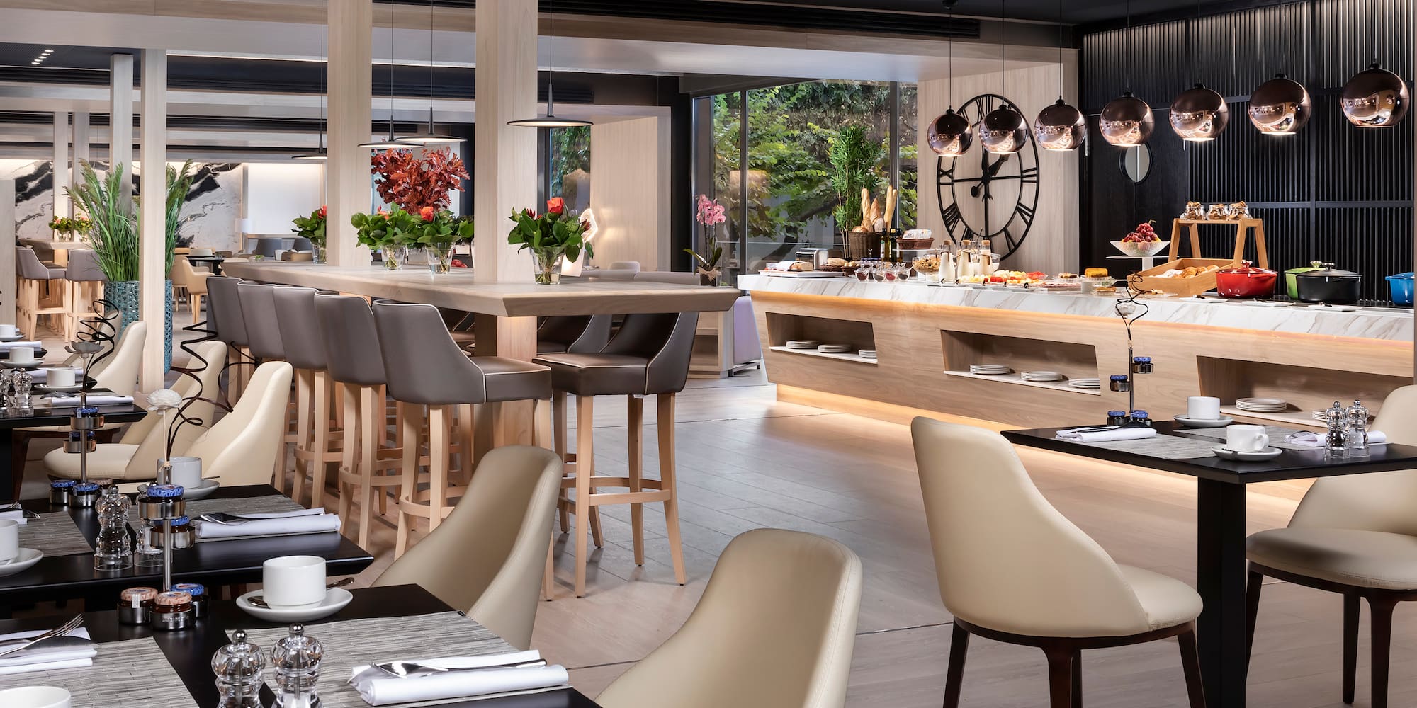 a restaurant with tables and chairs