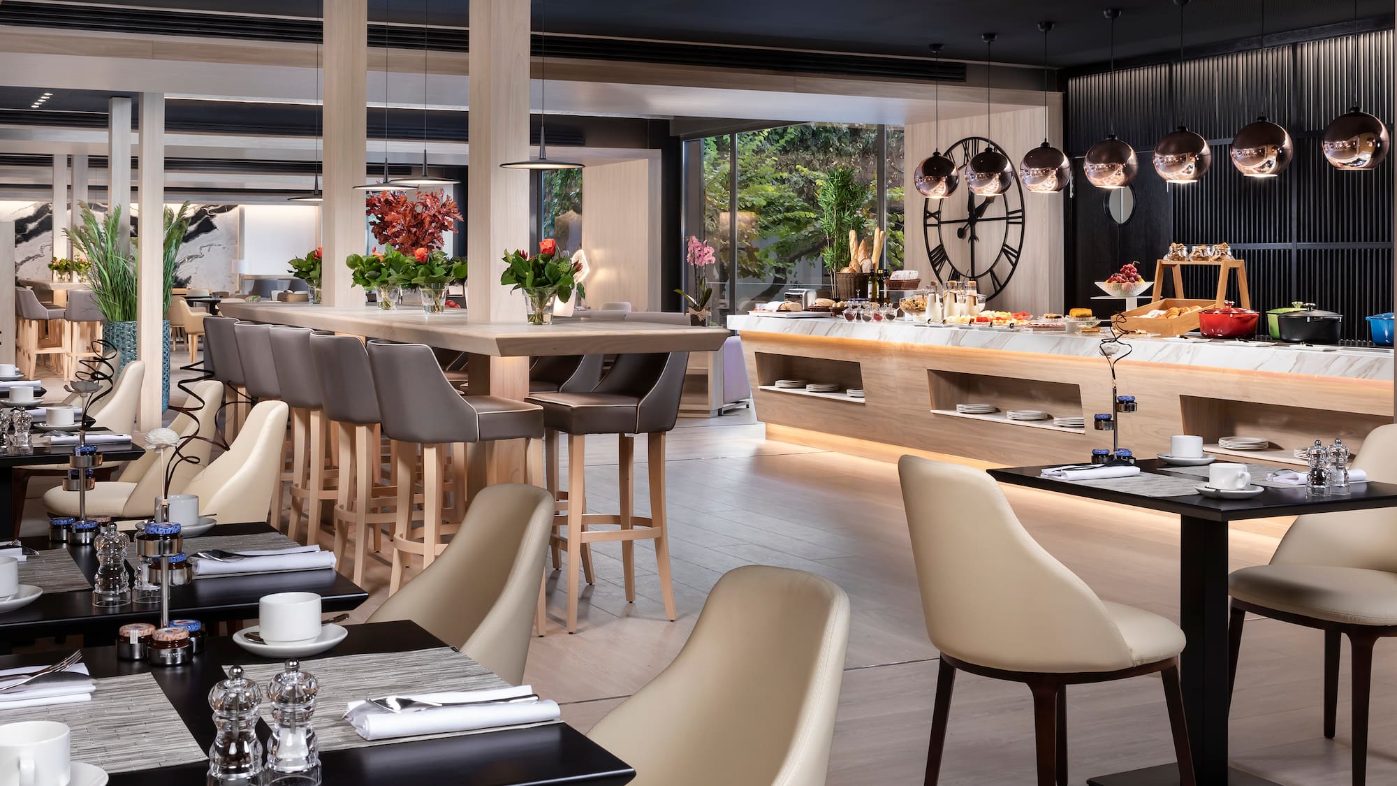 a restaurant with tables and chairs