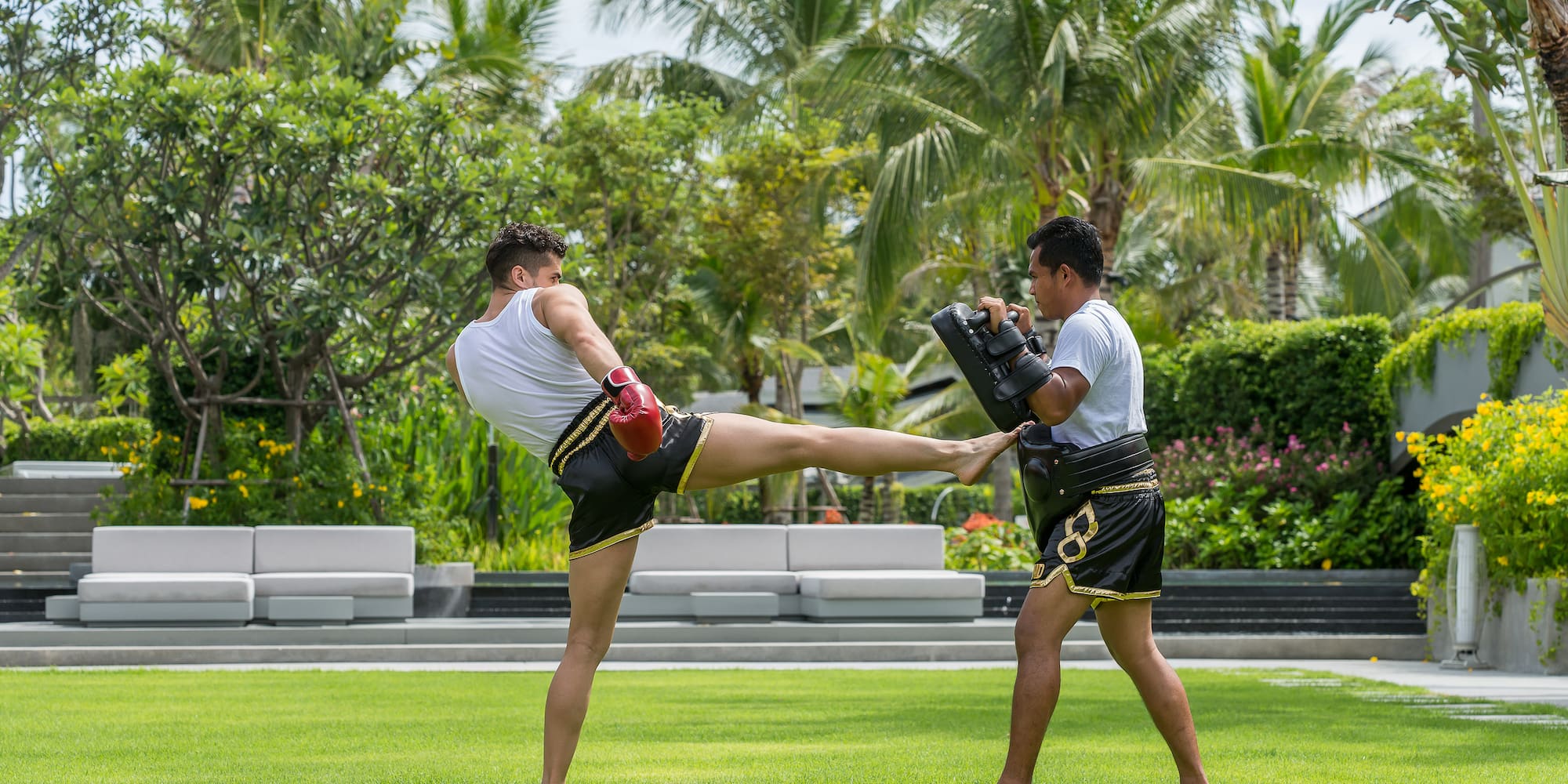 two men kicking a kick