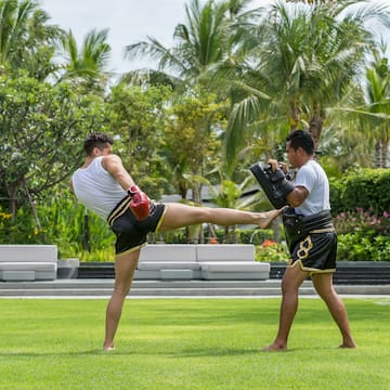 two men kicking a kick