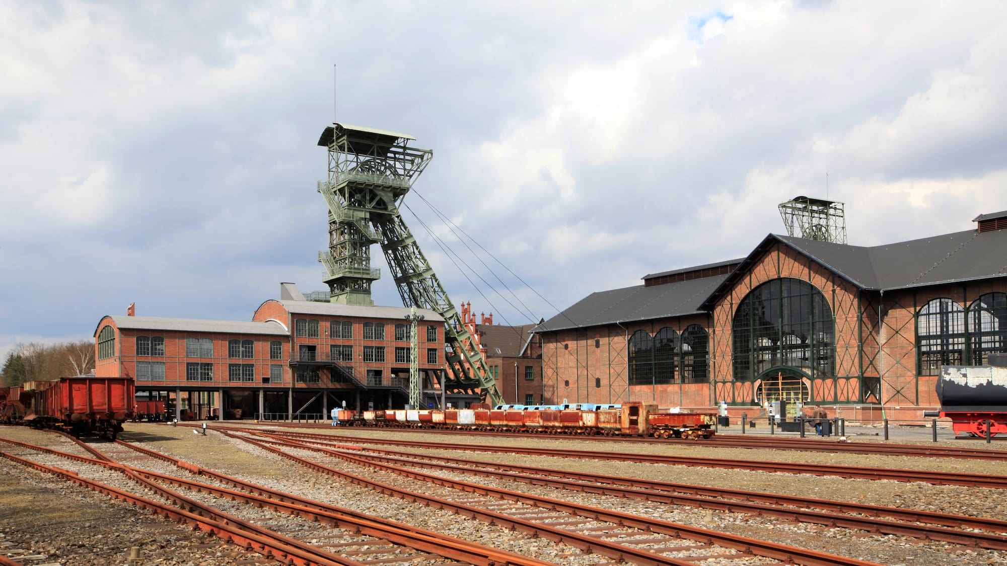 train tracks next to a building