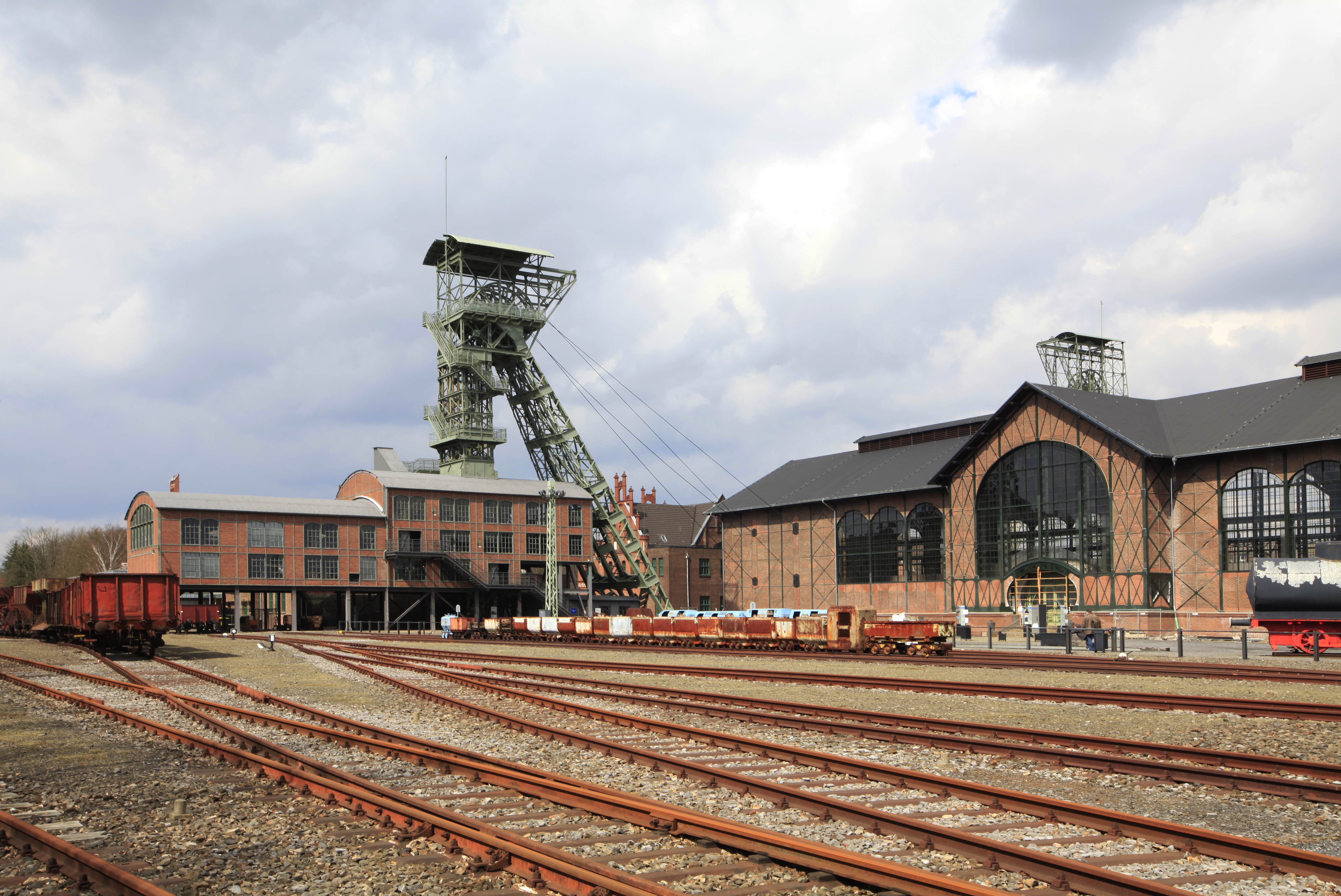 train tracks next to a building