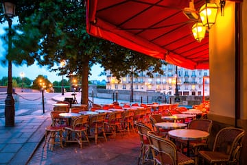 tables and chairs outside a restaurant