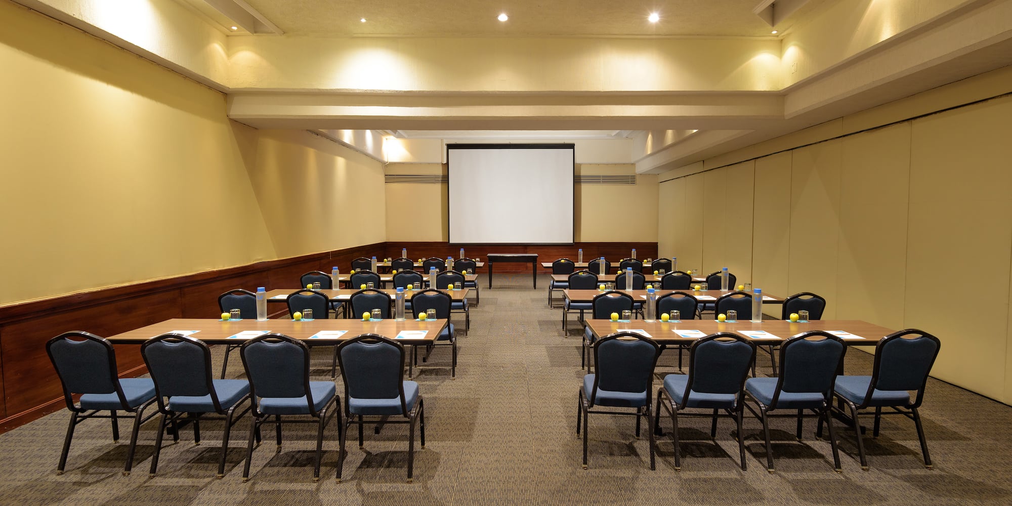 a room with tables and chairs