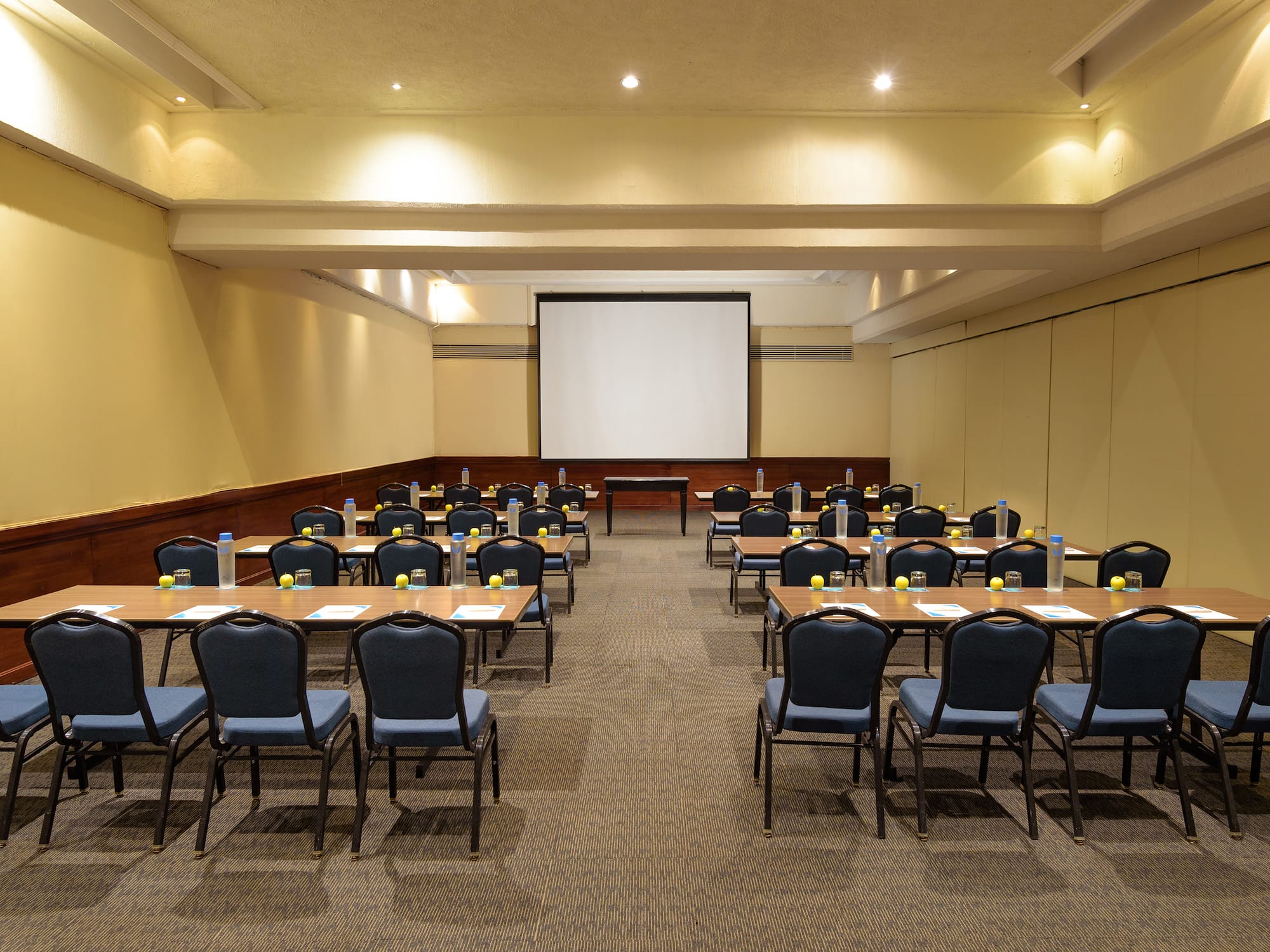 a room with tables and chairs
