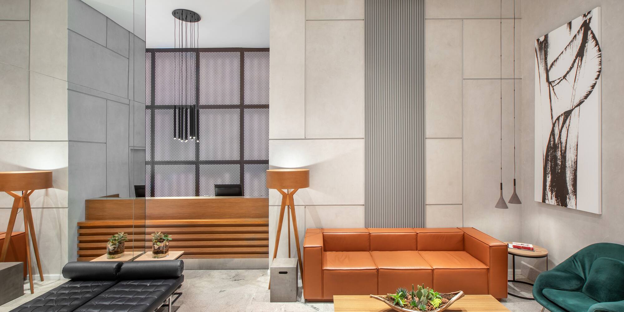 a room with a couch and coffee tables