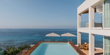 a pool overlooking the ocean