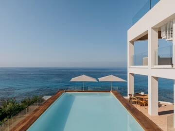 a pool overlooking the ocean