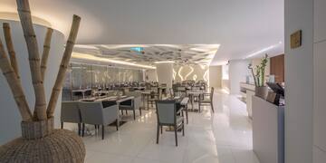 a room with tables and chairs