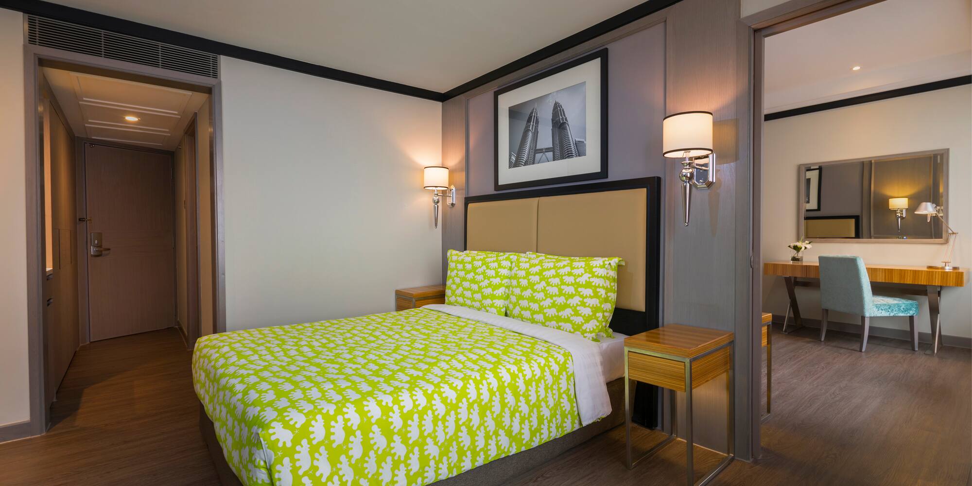 a bed with yellow sheets in a room