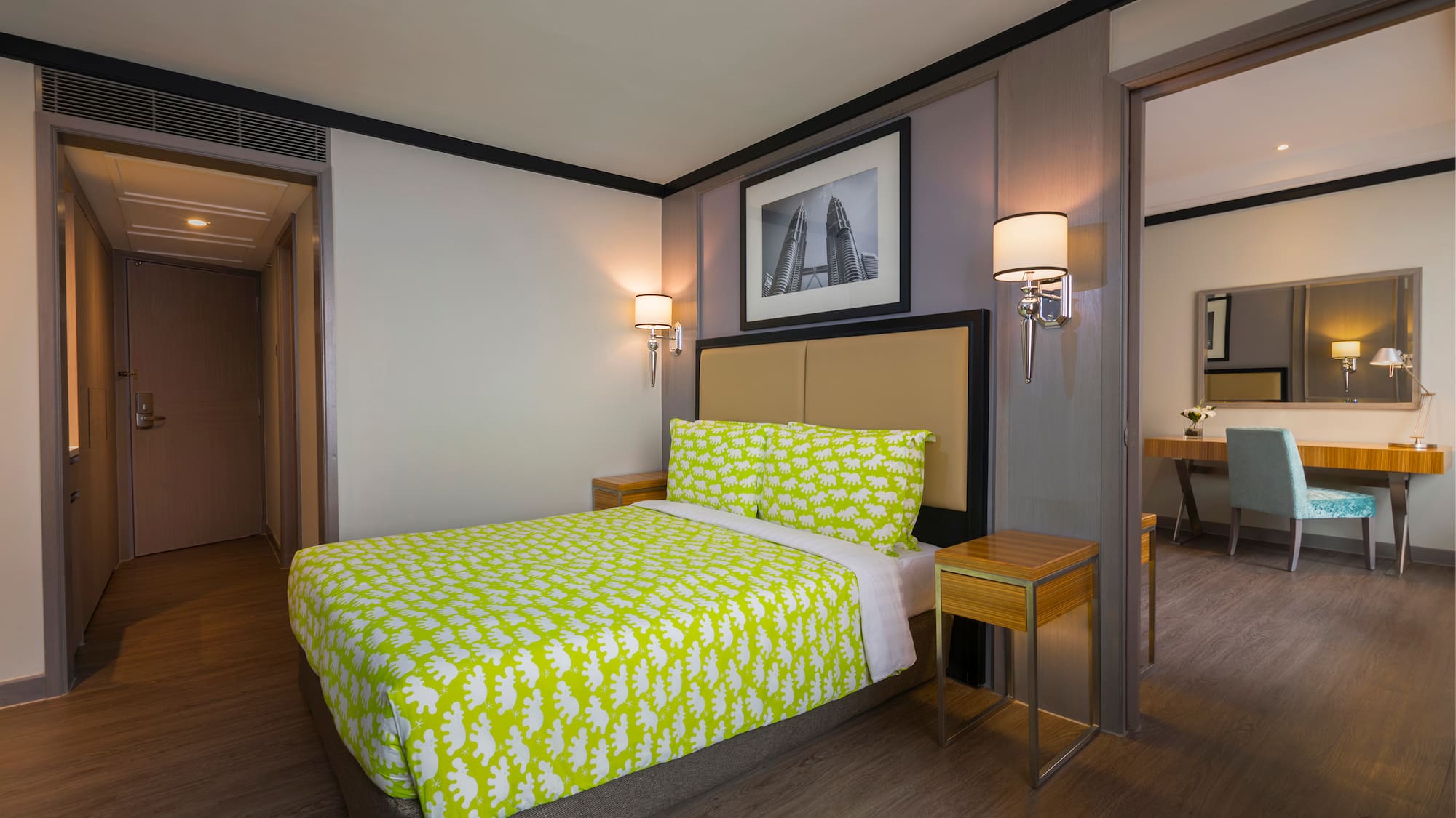 a bed with yellow sheets in a room