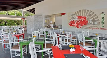 a restaurant with tables and chairs