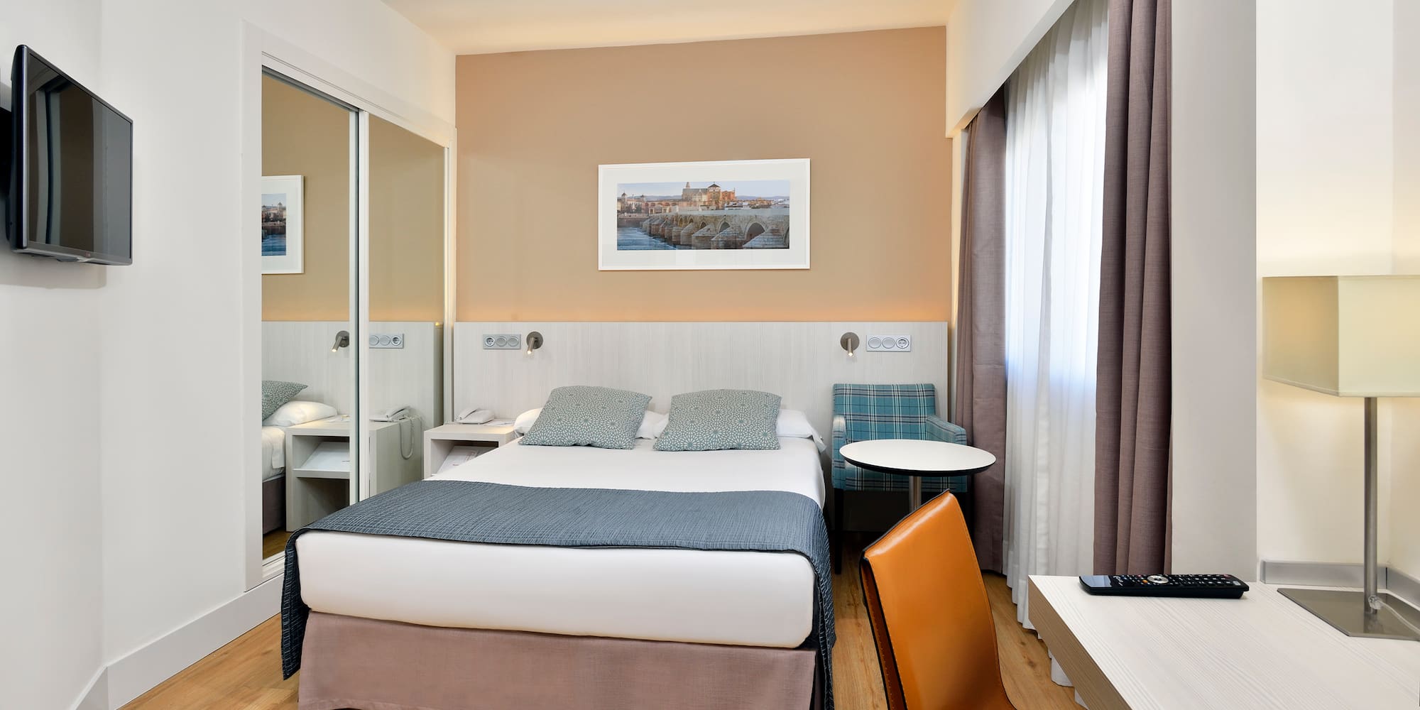 a room with a bed and a chair