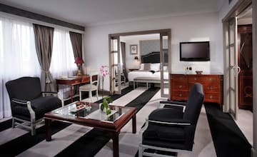 a room with a television and a bed
