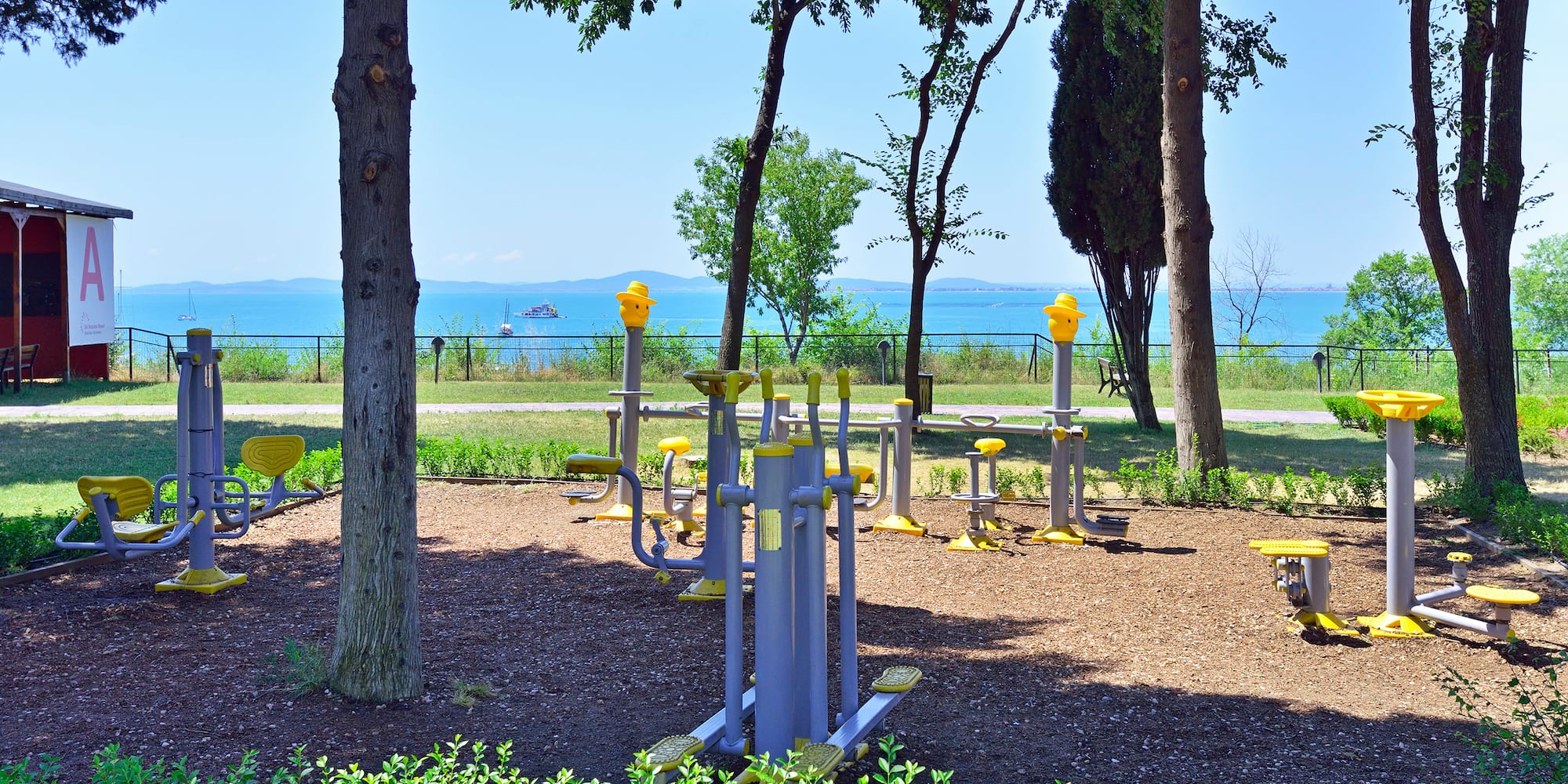 a playground with yellow and grey structures