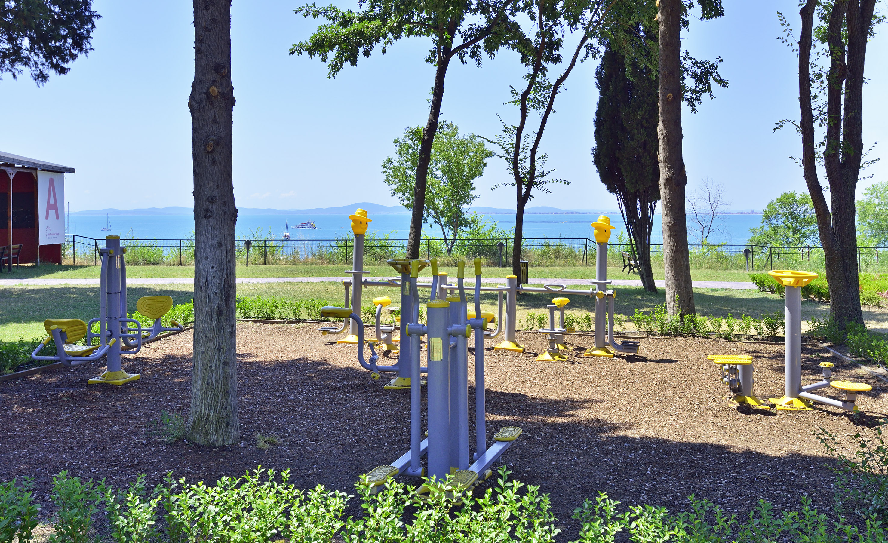 a playground with yellow and grey structures