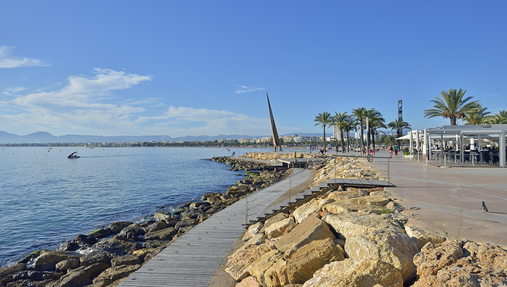 a boardwalk along a body of water