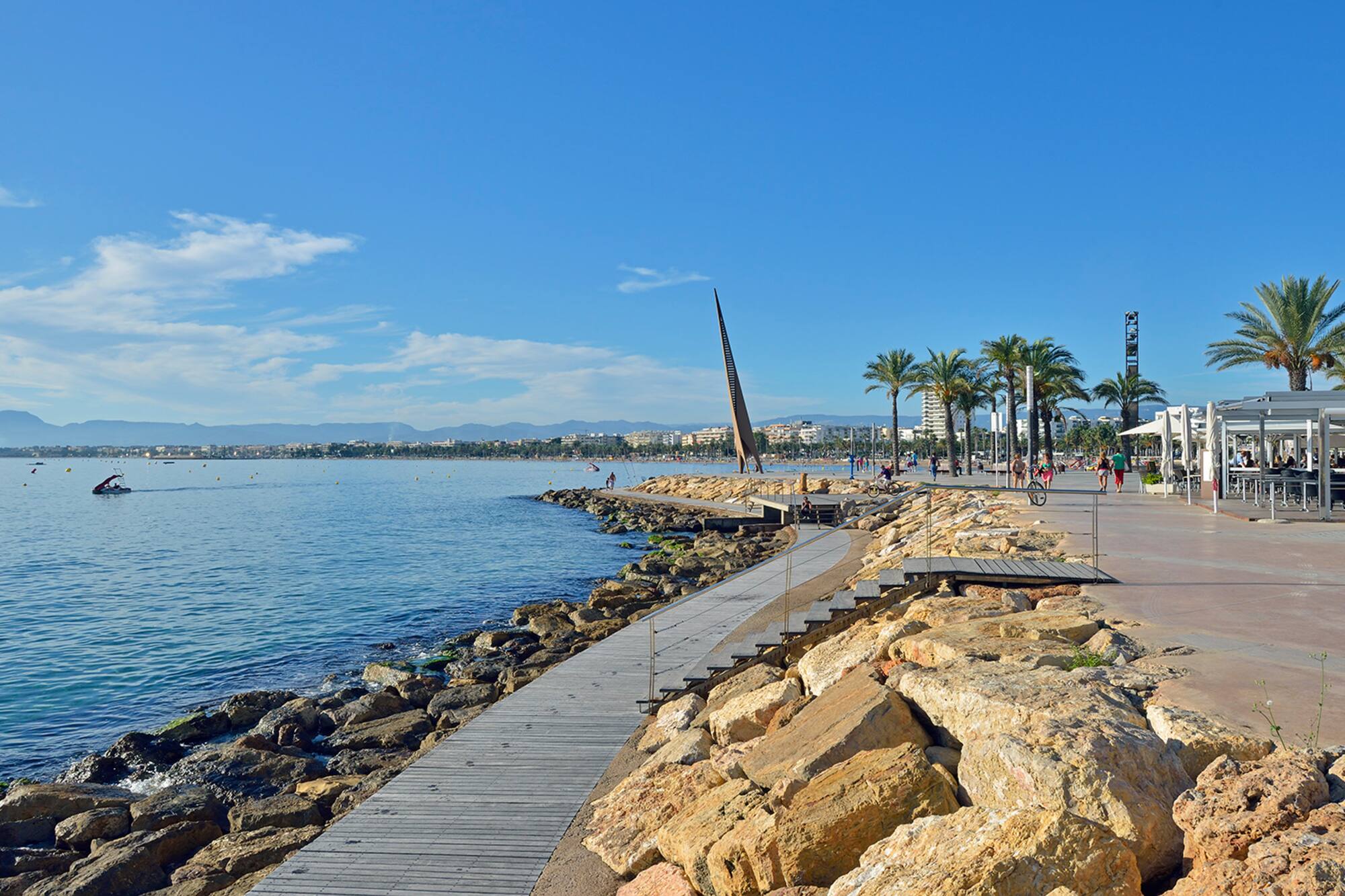 a boardwalk along a body of water