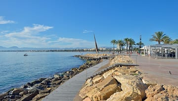 a boardwalk along a body of water