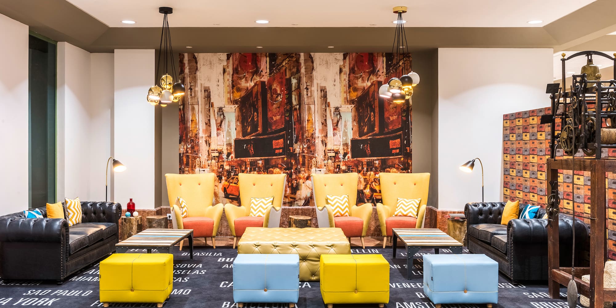 a room with a large group of chairs and tables