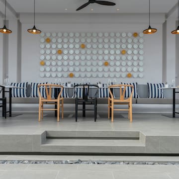 a room with a table and chairs