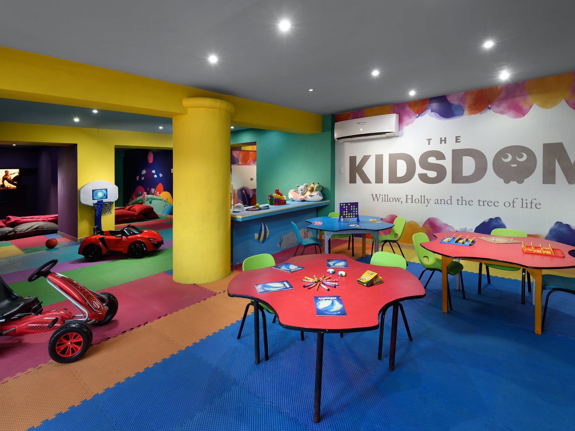 a room with colorful tables and toys