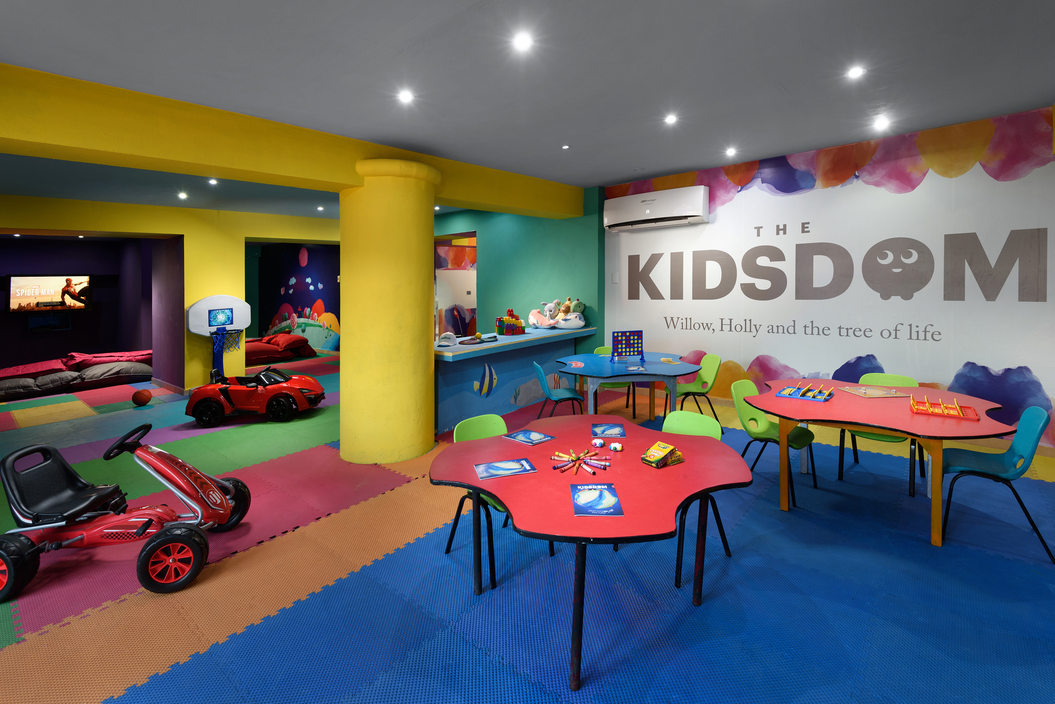 a room with colorful tables and toys