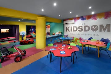 a room with colorful tables and toys