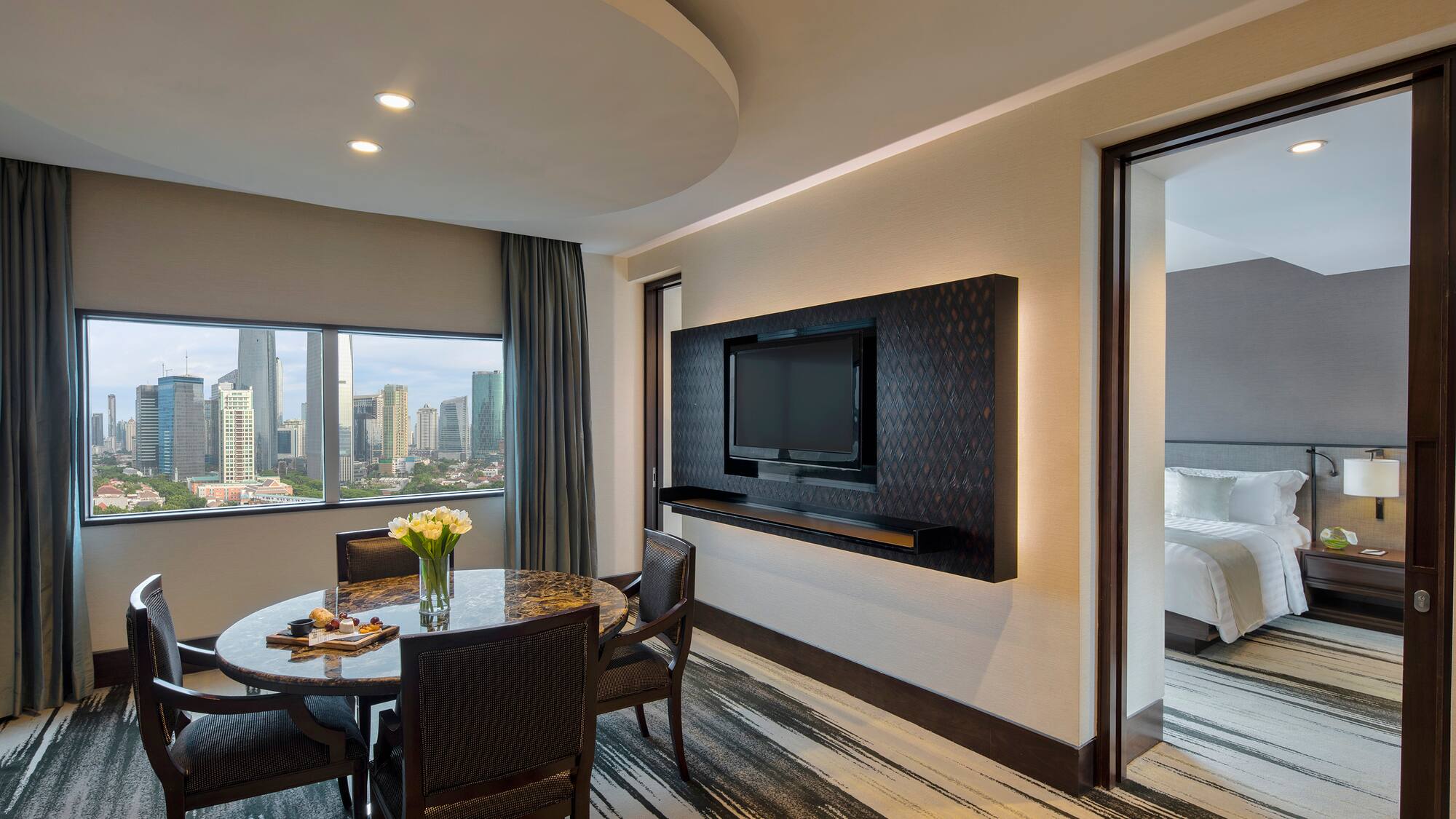 a room with a table and chairs