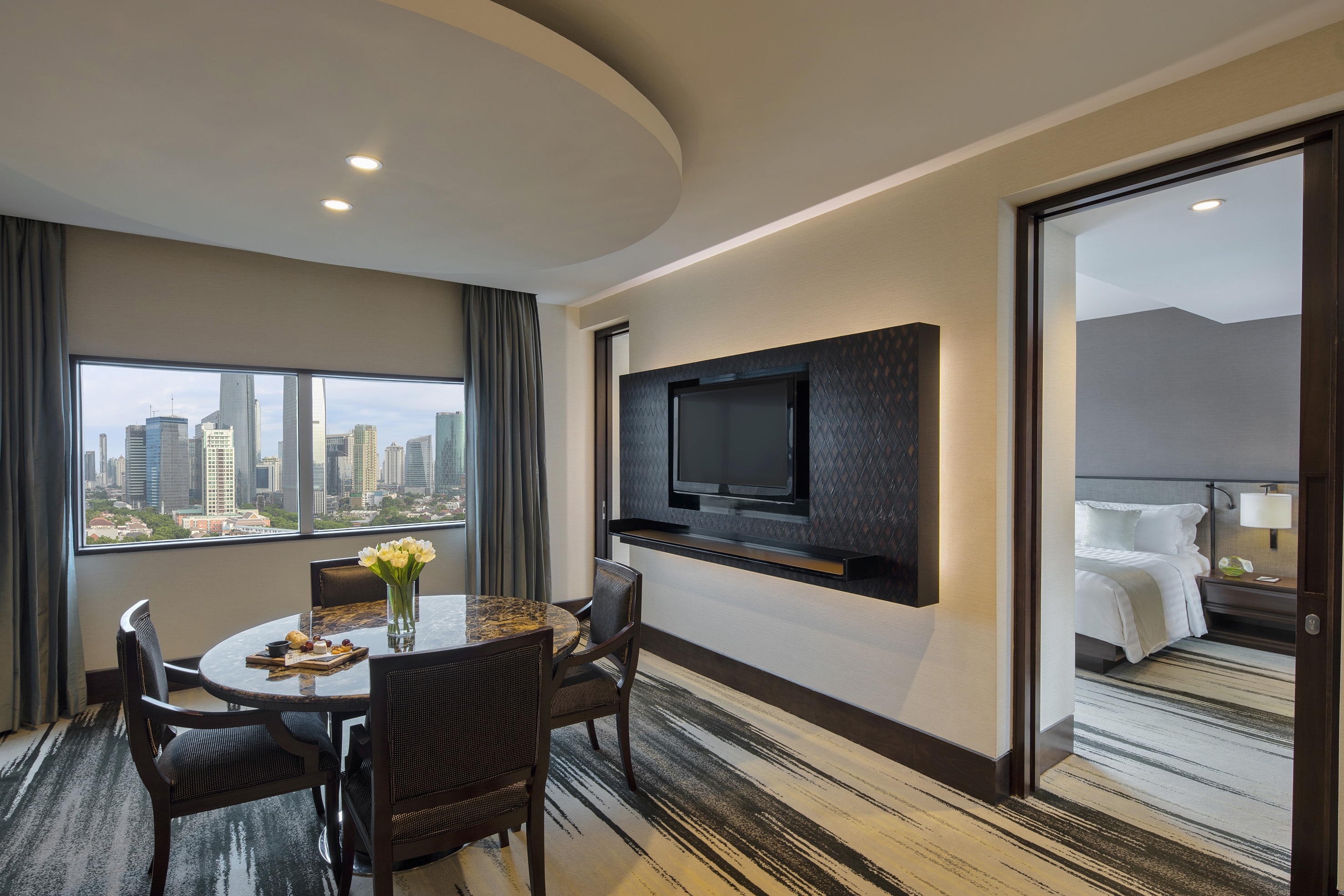 a room with a table and chairs